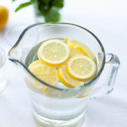 lemon water in pitcher, lemon water